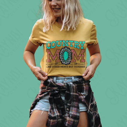 a woman wearing a country mom t - shirt