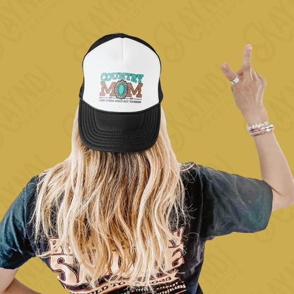 a woman with long hair wearing a black and white hat